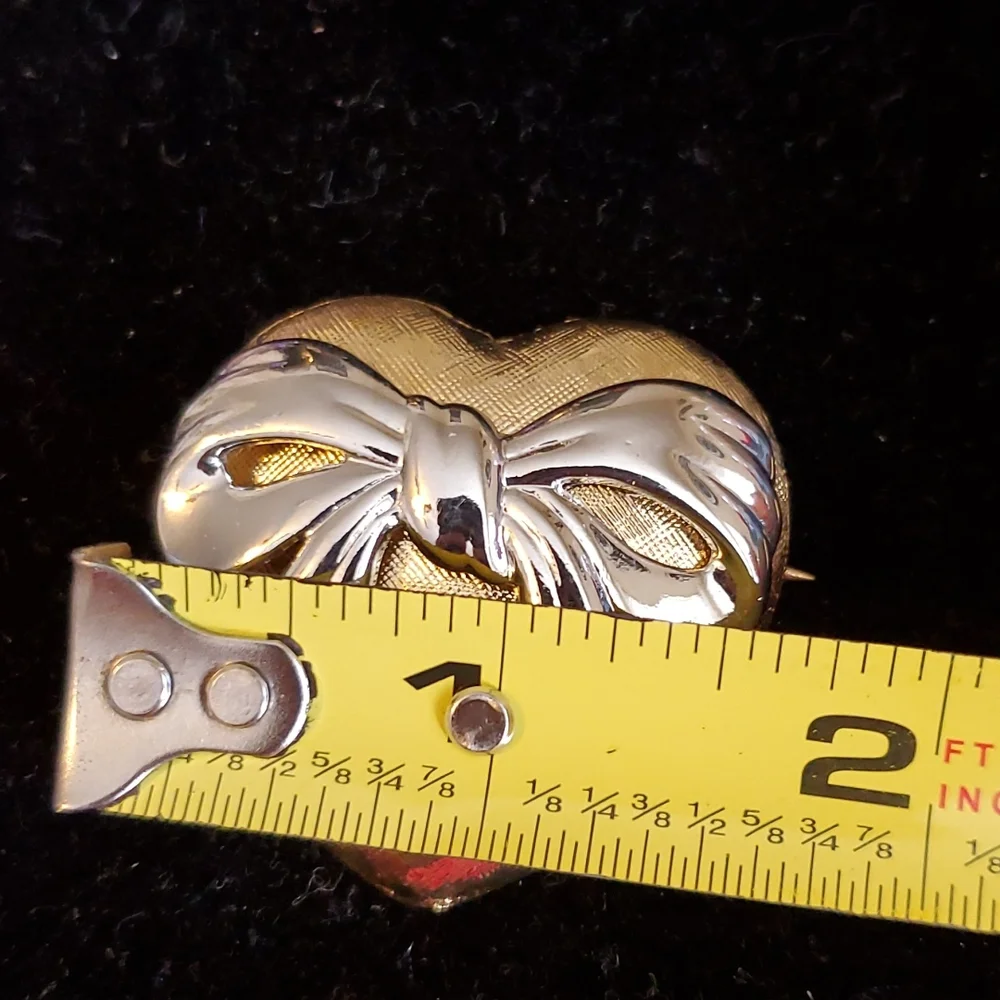 Vintage 80s goldtone textured heart brooch with silvertone bow